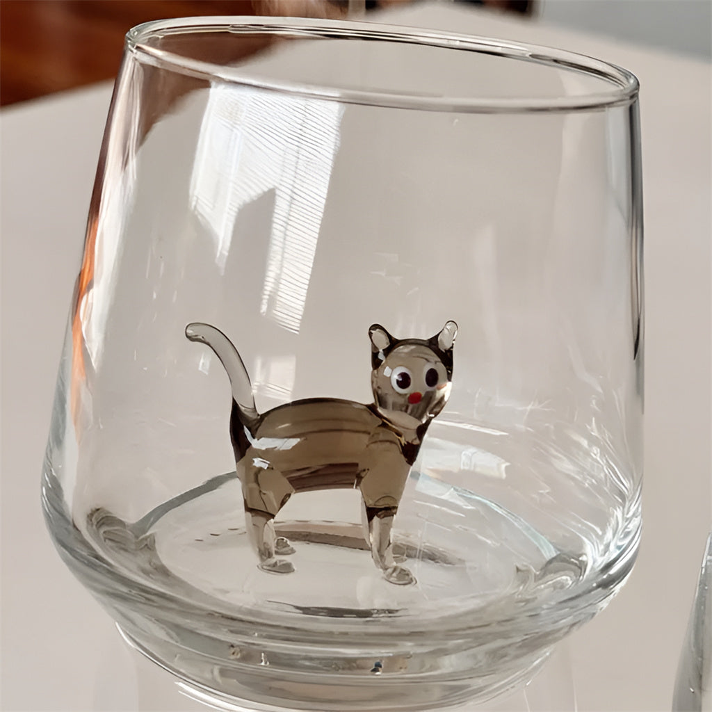 Drinking Glass with Cat Figurine