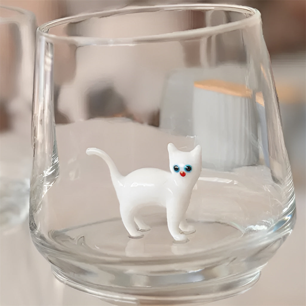 Drinking Glass with Cat Figurine